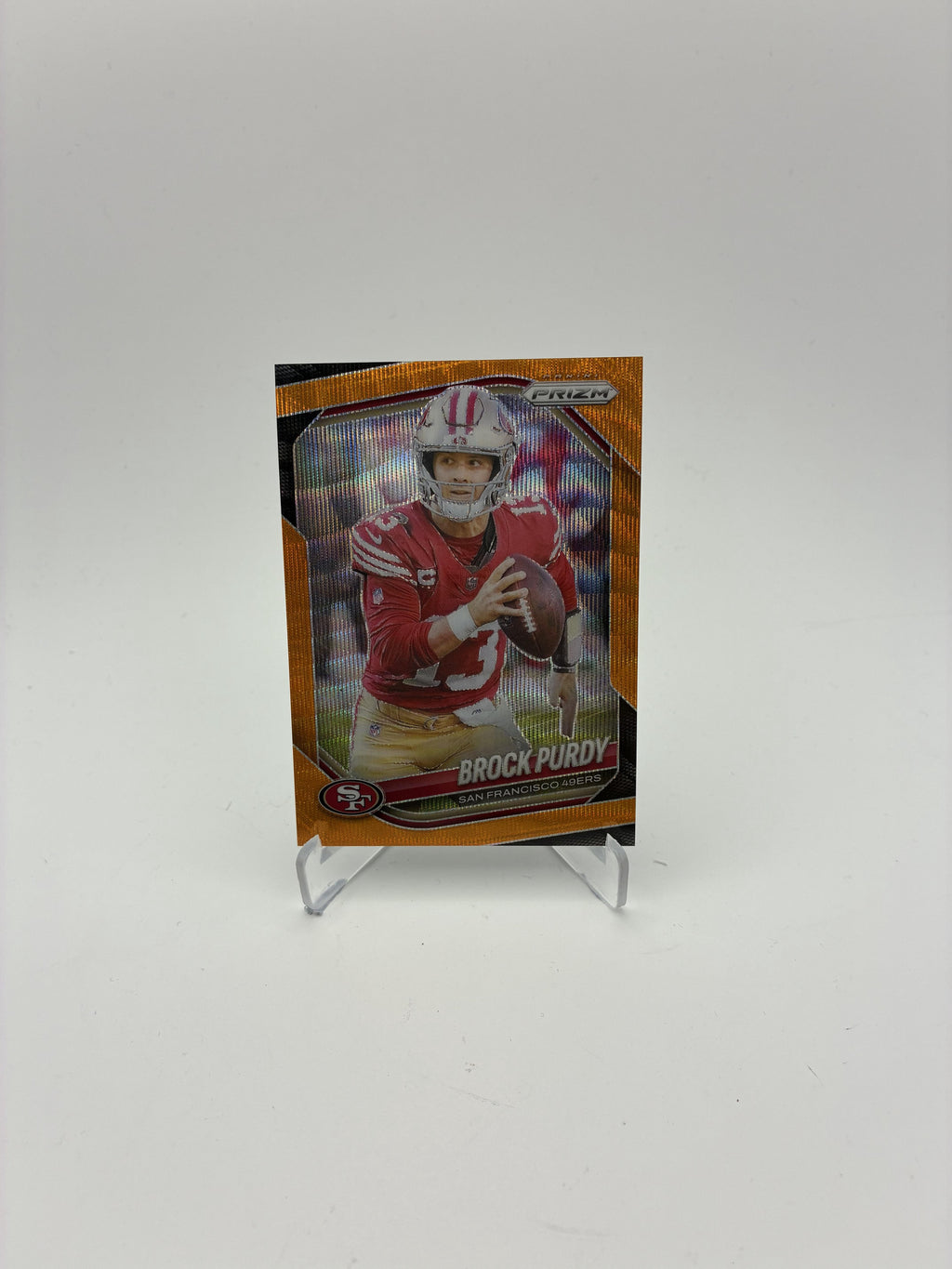 2025 Panini Prizm #255 Brock Purdy Orange Wave #/65