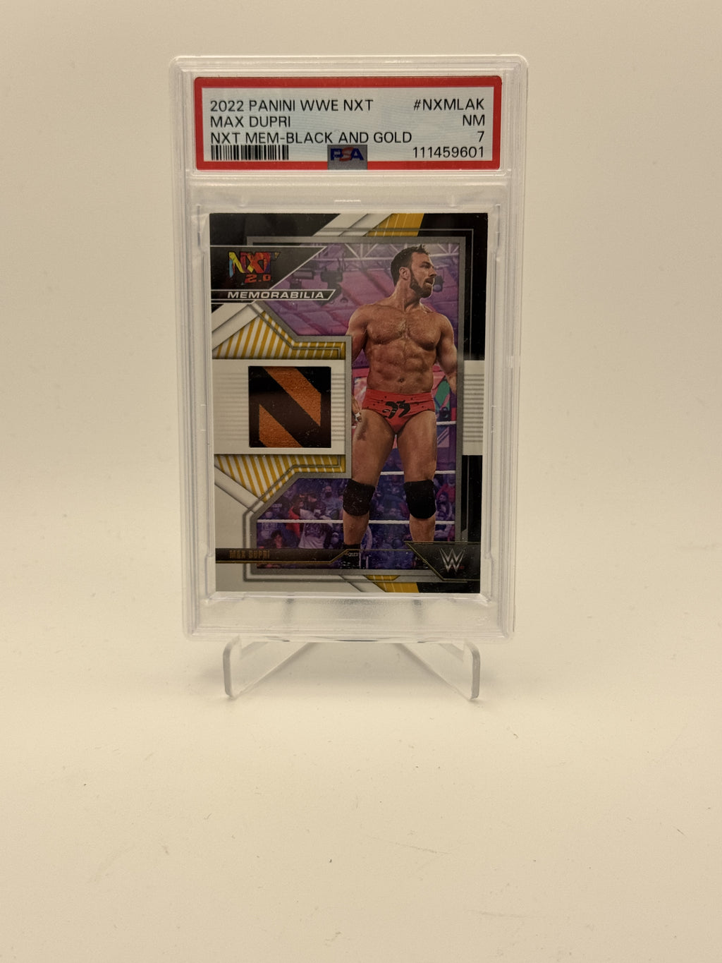 2022 Panini NXT 2.0 WWE Max Dupri NXT Memorabilia Black and Gold PSA 7 #/25