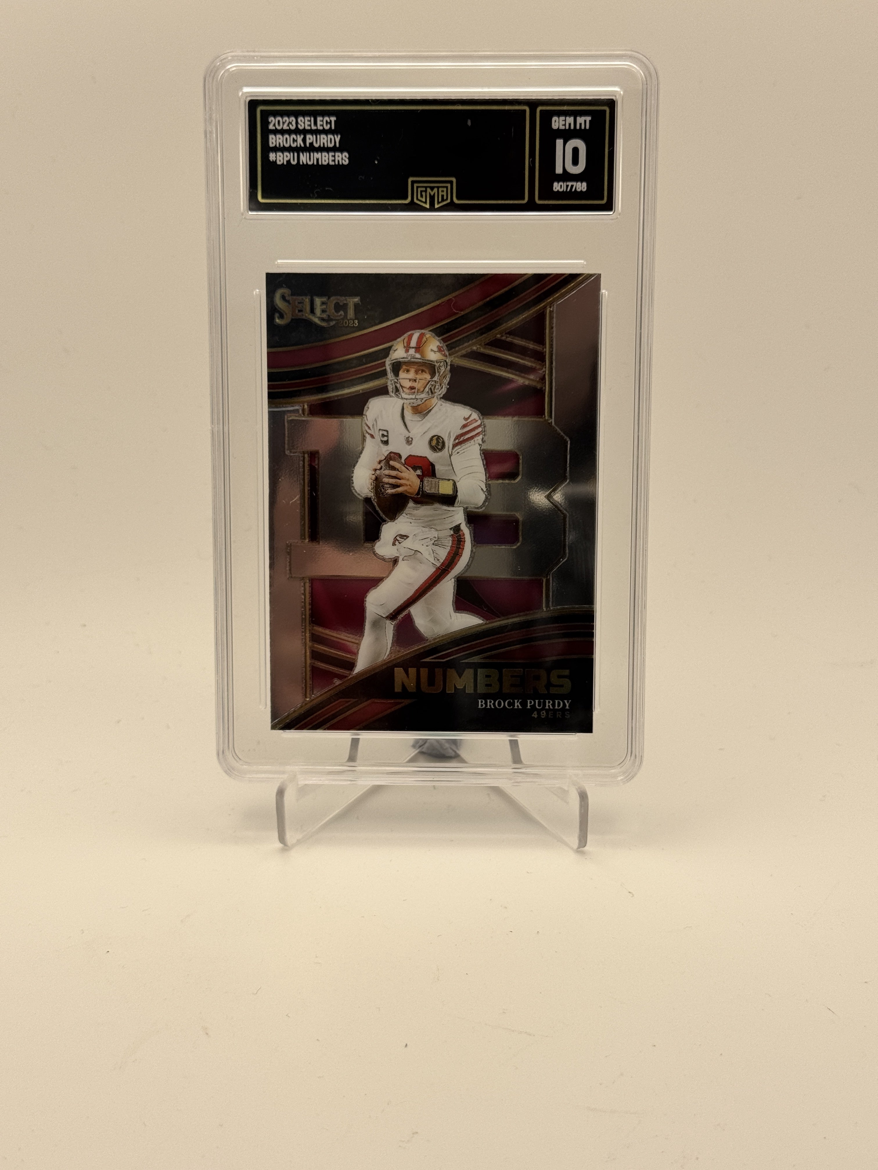2023 Panini Select #NMB-BPU Brock Purdy Numbers GMA 10