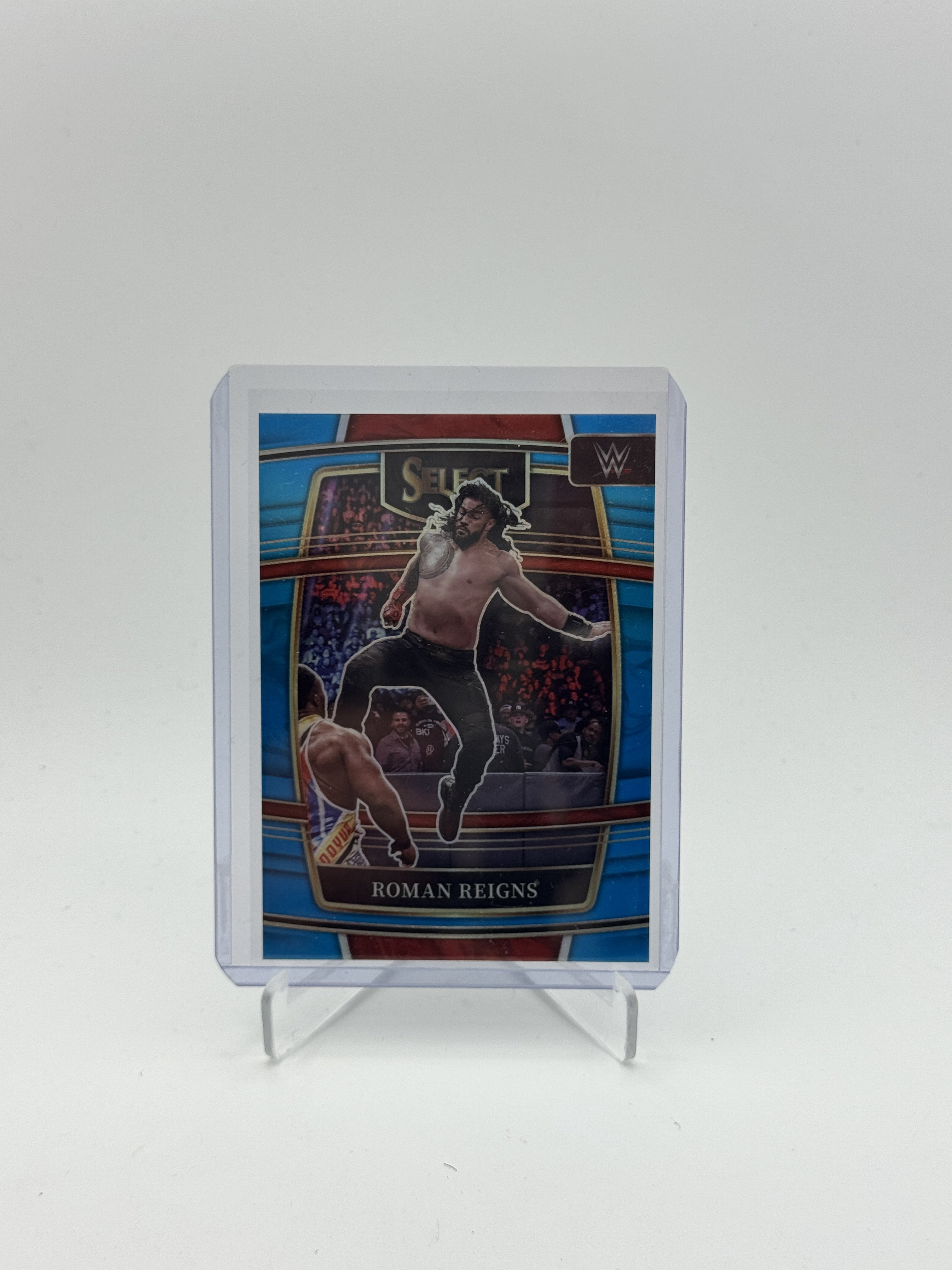 2022 Panini Select WWE #56 Roman Reigns Light Blue Prizms #/299