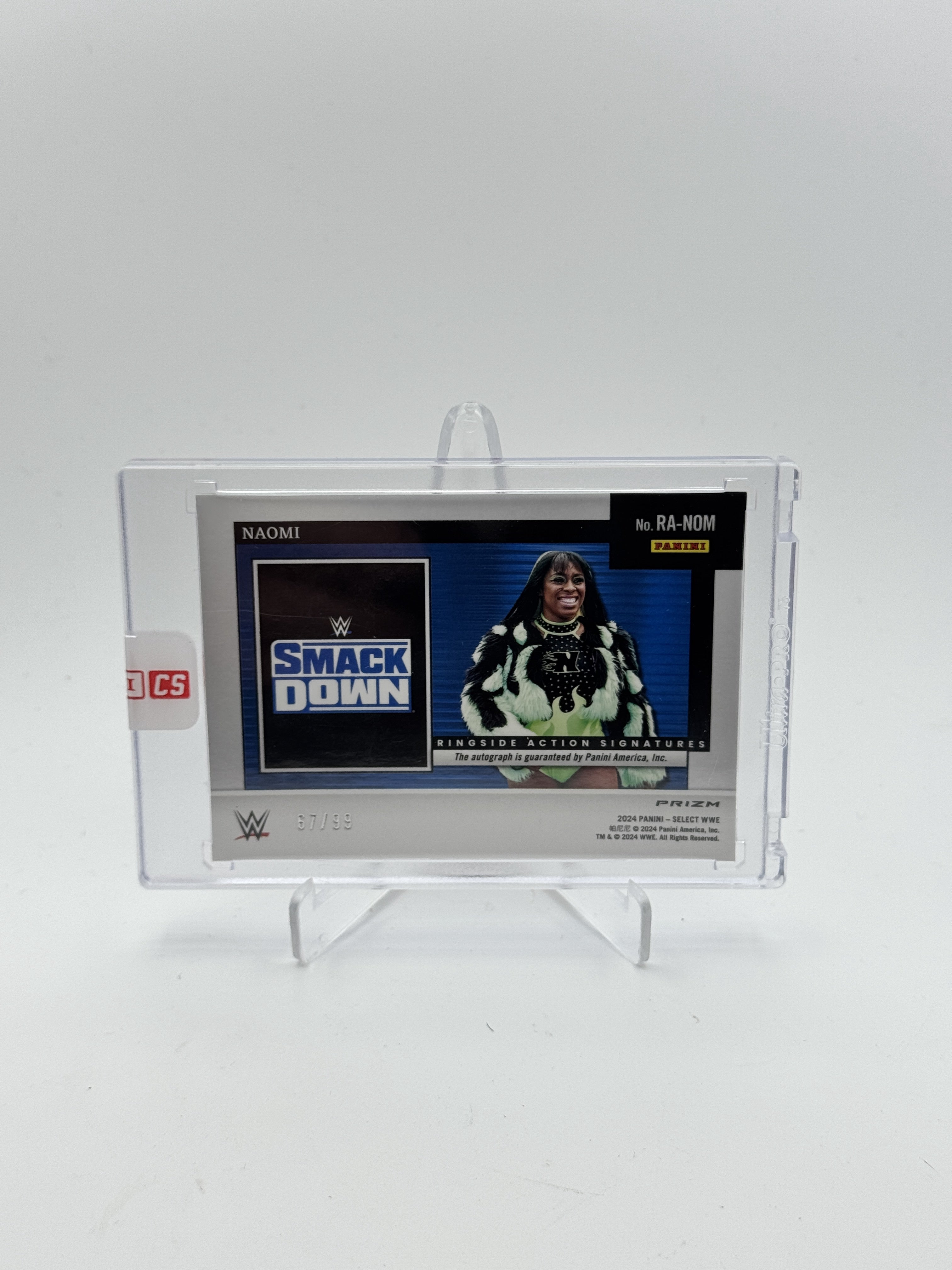 2024 Panini Select WWE #TBD Naomi Ringside Action Signatures Red Prizms #/99