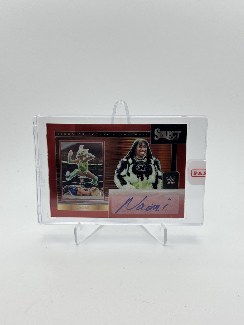 2024 Panini Select WWE #TBD Naomi Ringside Action Signatures Red Prizms #/99