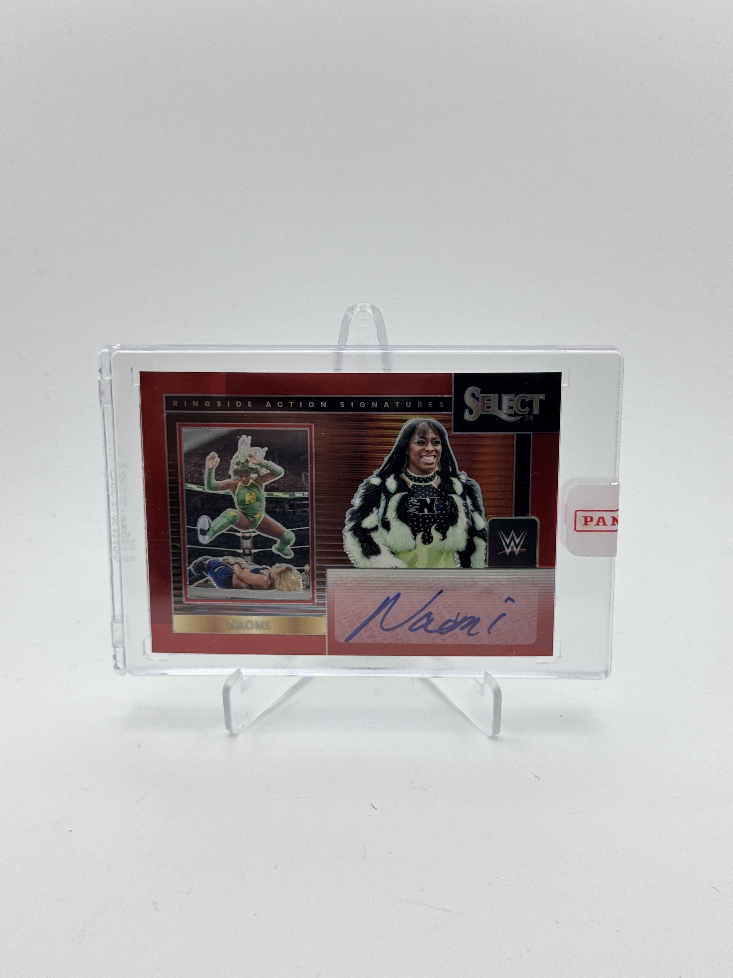 2024 Panini Select WWE #TBD Naomi Ringside Action Signatures Red Prizms #/99
