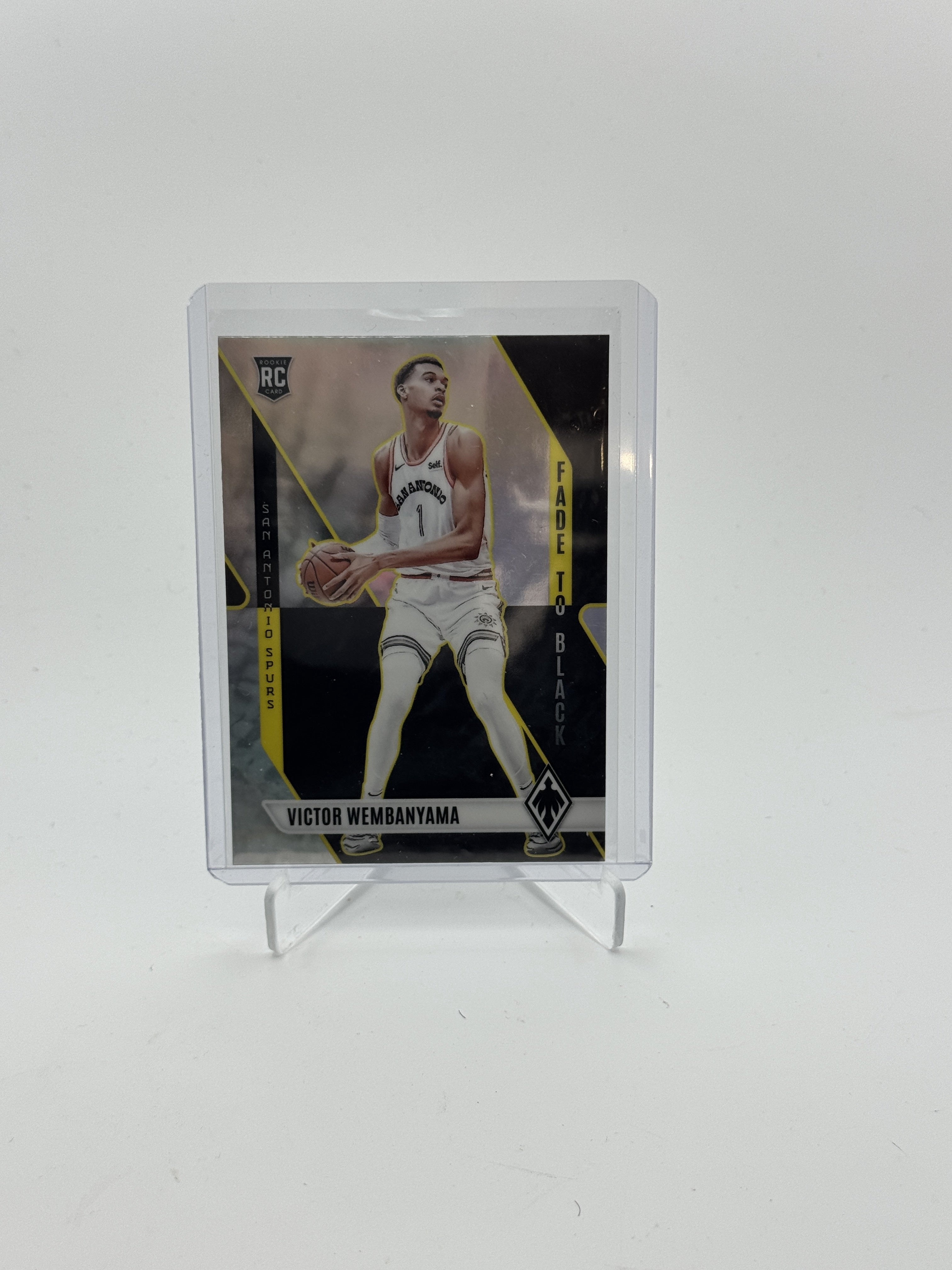 2023-24 Panini Phoenix #11 Victor Wembanyama Fade To Black Silver