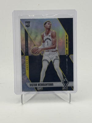 2023-24 Panini Phoenix #11 Victor Wembanyama Fade To Black Silver